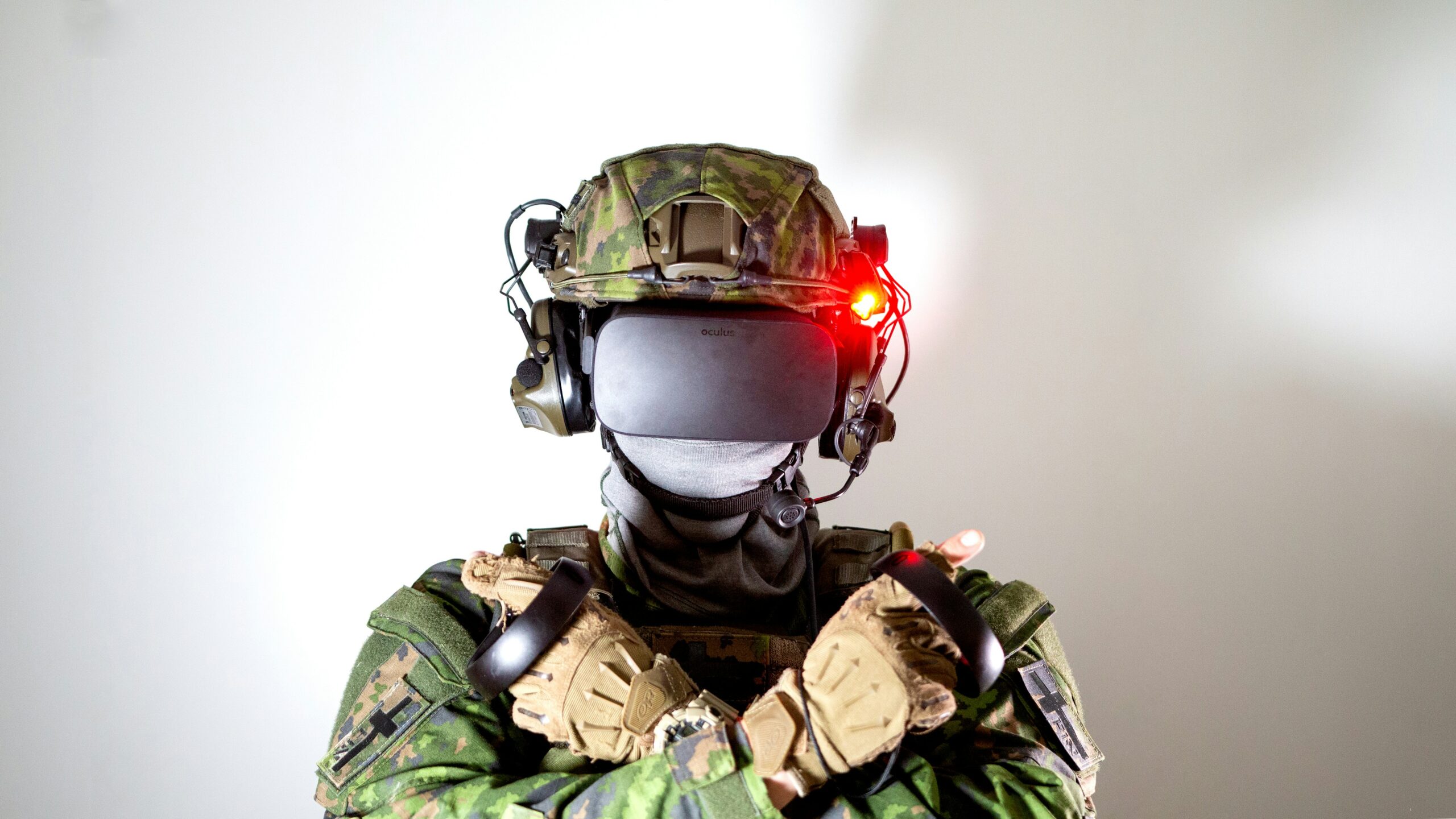 Soldier in military fatigues wearing a VR headset